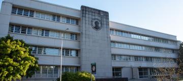 The weathered front General Administration Building shows its years of use. 