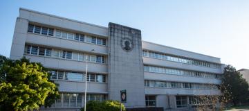 The weathered front General Administration Building shows its years of use. 